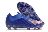 Chuteira New Balance Vivid Spark FG